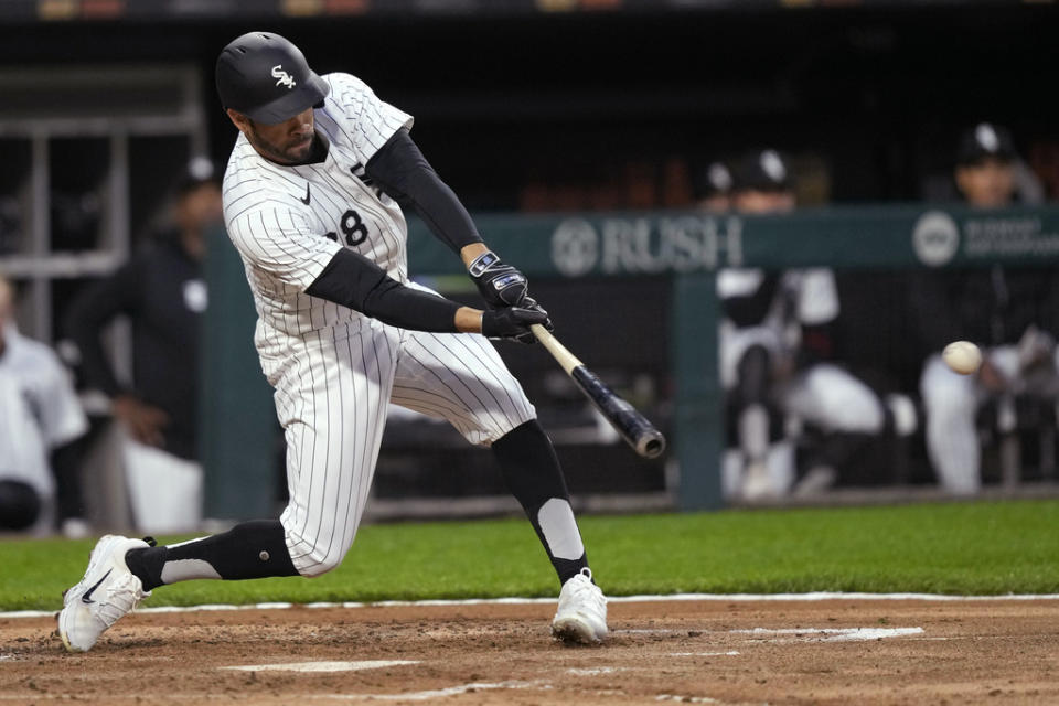 Chicago White Sox’s Tommy Pham hits an RBI single off Cleveland Guardians pitcher Ben Lively during the second inning of a baseball game Thursday, May 9, 2024, in Chicago. (AP Photo/Charles Rex Arbogast)