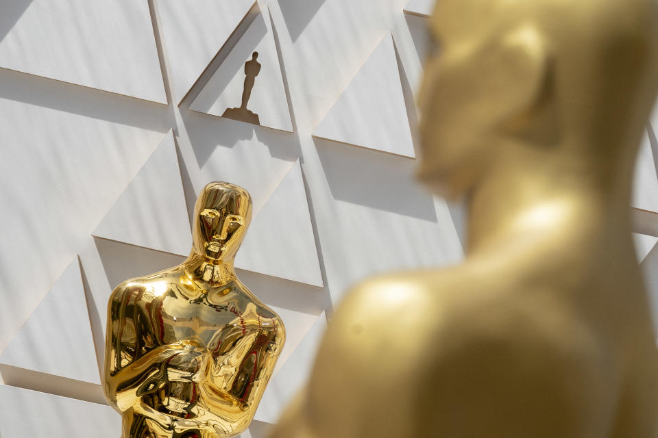 TOPSHOT - Oscar statues are seen near the red carpet area ahead of the Oscars Award show at the Dolby Theatre on Hollywood Boulevard on March 25, 2022 in Los Angeles, California. - The 94th Academy Awards will take place on March 27, 2022. (Photo by Stefani Reynolds / AFP) (Photo by STEFANI REYNOLDS/AFP via Getty Images)