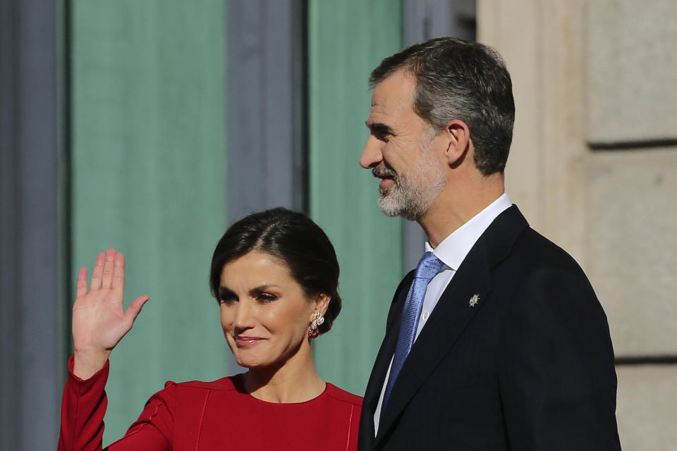 Spain's King Felipe VI and his wife Queen Letizia arrive for celebrations of the 40th anniversary of the Spanish Constitution at the Spanish parliament, in Madrid, Spain, on Thursday, Dec. 6, 2018. (AP Photo/Andrea Comas)