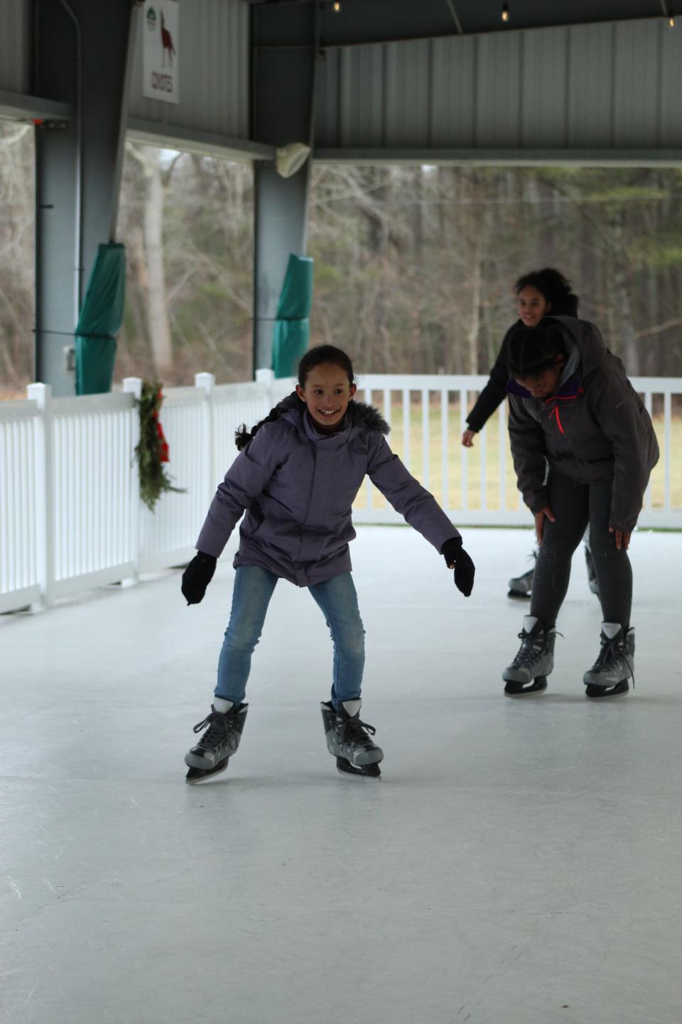 Boys & Girls Clubs of Metro South members from the Brockton clubhouse enjoy a trip out to Camp Riverside in Taunton to ice skate during December vacation at the synthetic rink.