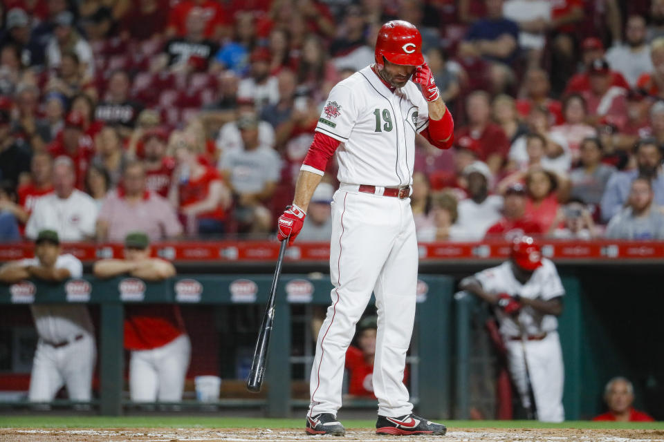 Cincinnati Reds' Joey Votto reacts after striking out against New York Mets starting pitcher Jacob deGrom to close the third inning of a baseball game, Friday, Sept. 20, 2019, in Cincinnati. (AP Photo/John Minchillo)