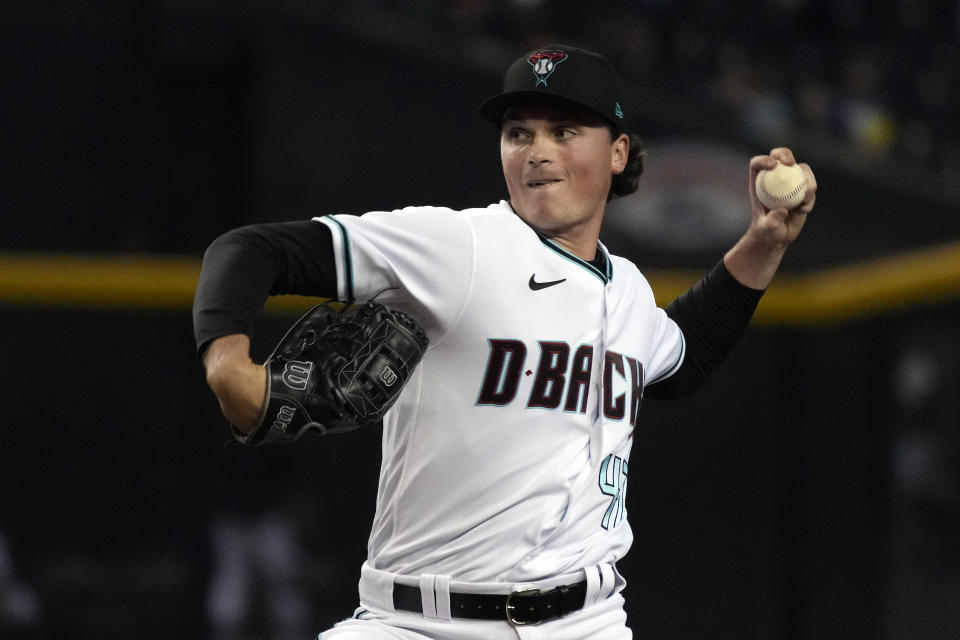 Arizona Diamondbacks pitcher Tommy Henry throws to a Pittsburgh Pirates batter during the first inning of a baseball game Tuesday, Aug. 9, 2022, in Phoenix. (AP Photo/Rick Scuteri)