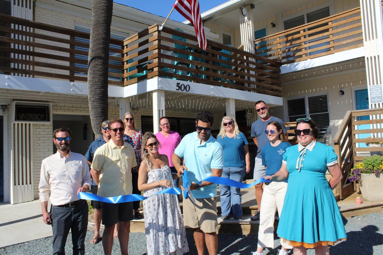 A Southport-Oak Island Area Chamber of Commerce ribbon cutting ceremony was held May 2 to celebrate the completion of a major renovation project for The Beach House Motel & Suites.