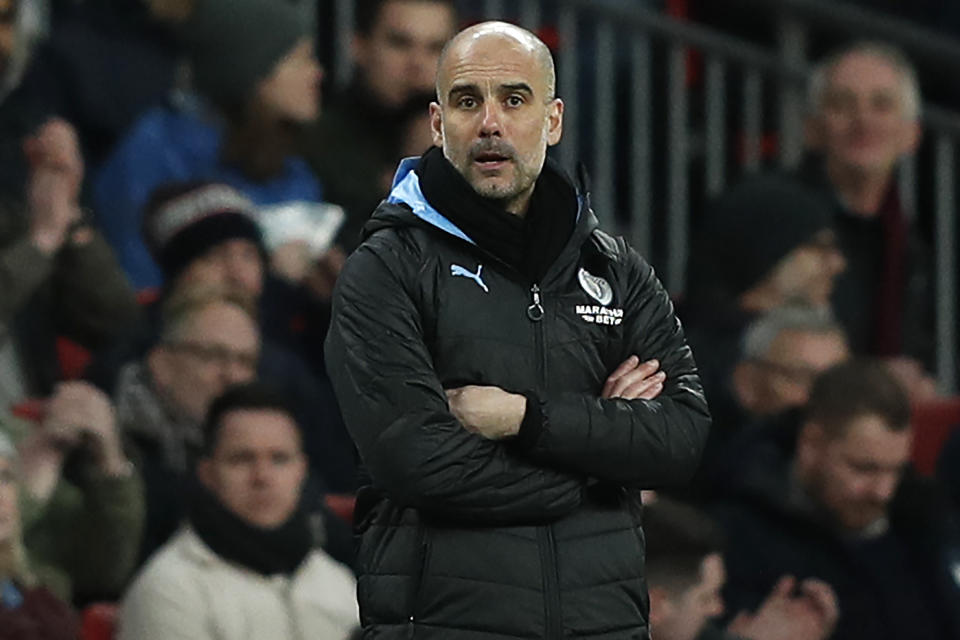 Manchester City's Spanish manager Pep Guardiola watches from the touchline during the English League Cup final football match between Aston Villa and Manchester City at Wembley stadium in London on March 1, 2020. (Photo by Adrian DENNIS / AFP) / RESTRICTED TO EDITORIAL USE. No use with unauthorized audio, video, data, fixture lists, club/league logos or 'live' services. Online in-match use limited to 120 images. An additional 40 images may be used in extra time. No video emulation. Social media in-match use limited to 120 images. An additional 40 images may be used in extra time. No use in betting publications, games or single club/league/player publications. /  (Photo by ADRIAN DENNIS/AFP via Getty Images)