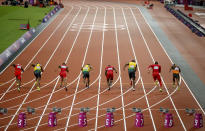 Jamaica's Usain Bolt, in lane 7, races at the men's 100m final during the London 2012 Olympic Games at the Olympic Stadium August 5, 2012. REUTERS/Paul Hanna (BRITAIN - Tags: SPORT ATHLETICS SPORT OLYMPICS) 