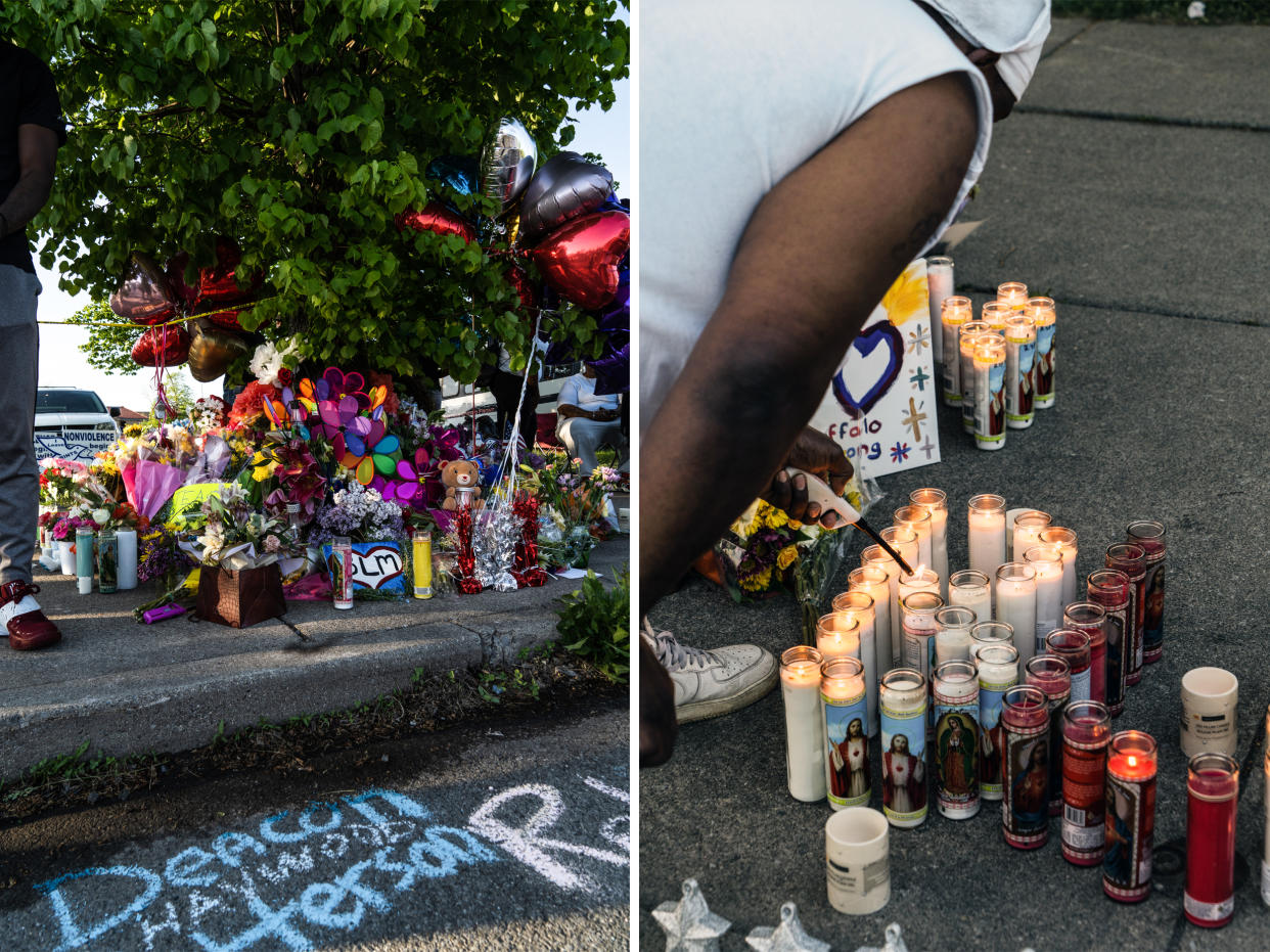 A shrine erected in memory of the fallen community members filled with signs, flowers and candles in Buffalo, N.Y., on May 15, 2022. (Joshua Thermidor for NBC News)