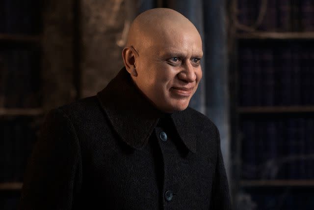 <p>Vlad Cioplea/Netflix </p> Fred Armisen as Uncle Fester on 'Wednesday'