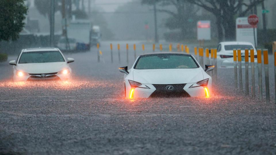 PHOTO: Stalled vehicles sit in a flooded street in Aventura, FL, June 12, 2024. (Joe Raedle/Getty Images)