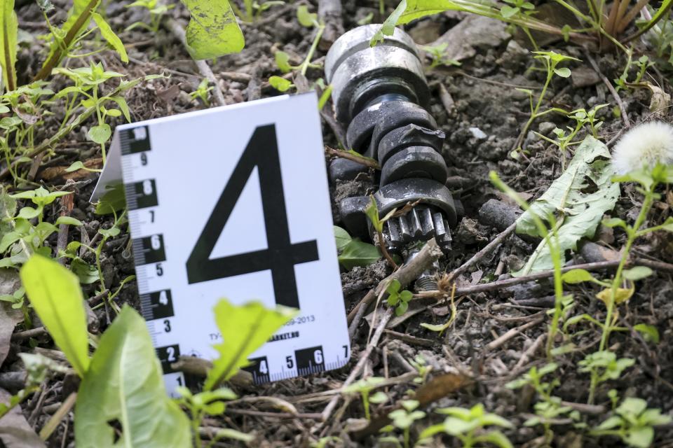 This photo shows a part of a Ukrainian drone which reportedly damaged an apartment building in Moscow, Russia, Tuesday, May 30, 2023. In Moscow, residents reported hearing explosions and Mayor Sergei Sobyanin later confirmed there had been a drone attack that he said caused "insignificant" damage. (AP Photo)