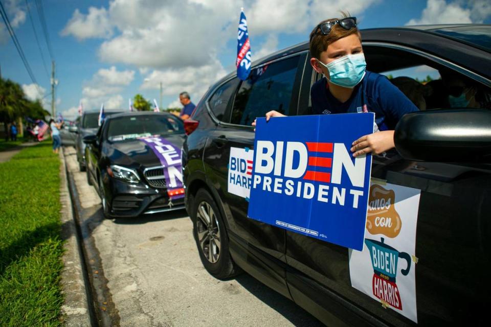 Matthew Hill, 10, participates in a Cubans Con Biden caravan at Bright Park in Hialeah, Florida, on Saturday, September 19, 2020.