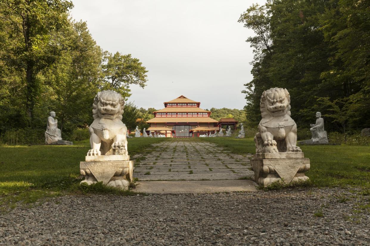 Carmel, NY USA - August 17, 2014: Bodhi path leading to Great Buddha Hall in Chuang Yen Monastery