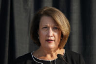 University of Utah President Ruth Watkins speaks during a news conference Thursday, Oct. 22, 2020, in Salt Lake City. The parents of a University of Utah track athlete who was killed by her ex-boyfriend on campus two years ago reached a $13.5 million settlement Thursday with the university, which acknowledged that it didn't handle the woman's case properly. (AP Photo/Rick Bowmer)