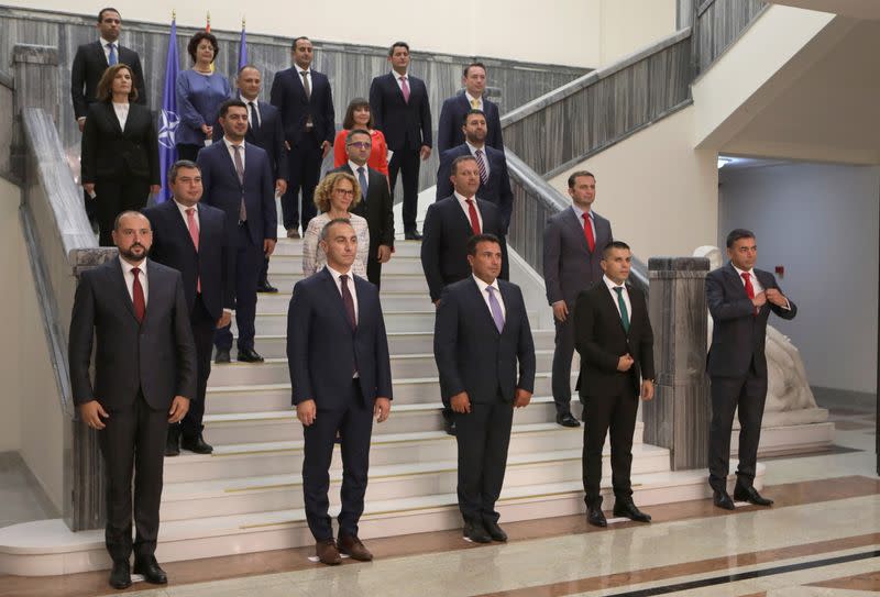 Zaev, leader of the ruling SDSM party, poses during a group photo with newly elected ministers at the Macedonian parliament in Skopje
