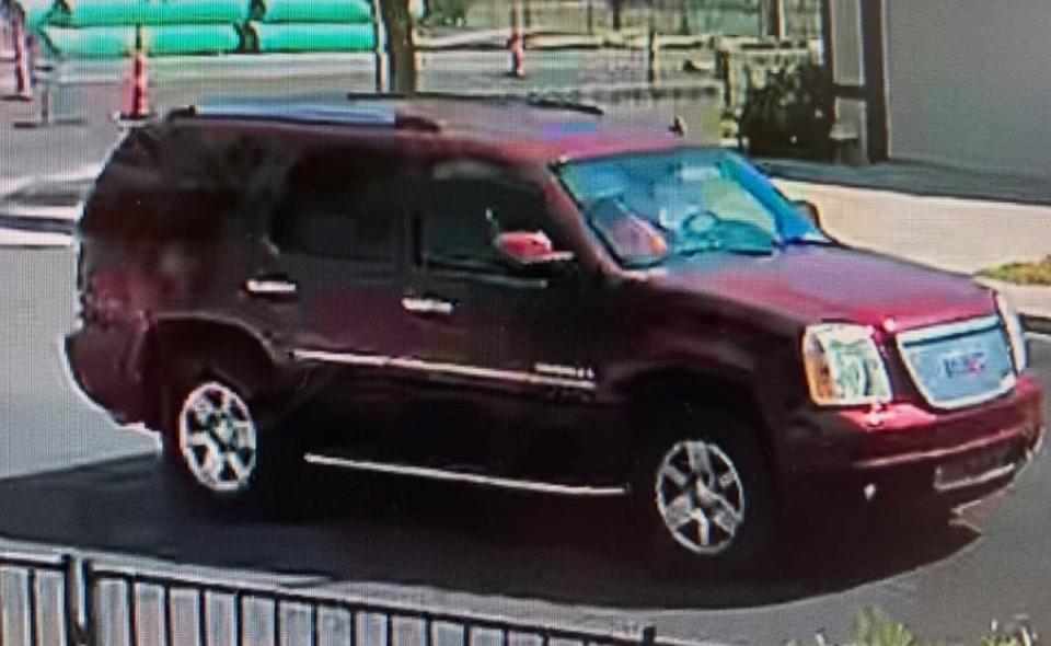 Investigators said they were looking for a 2007 to 2014 red or maroon GMC Yukon Denali vehicle in connection with the killing (LVMPD)