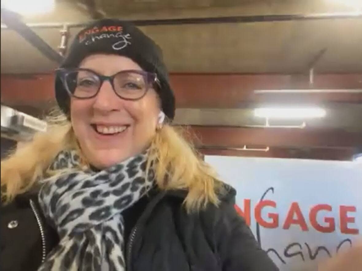Jody Steinhauer, founder of Engage and Change, says the charity has put together 3,000 winter survival kits that are being distributed to community agencies that will hand the red backpacks out to unhoused people in the GTA. (CBC - image credit)