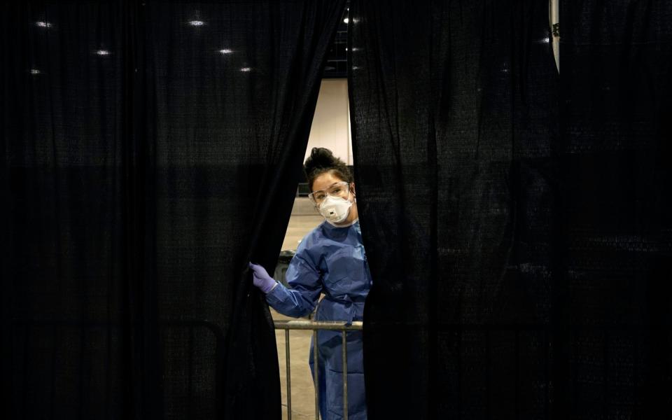 A coronavirus testing site in Las Vegas, Nevada. Residents in the state will be encouraged to post their votes - AP