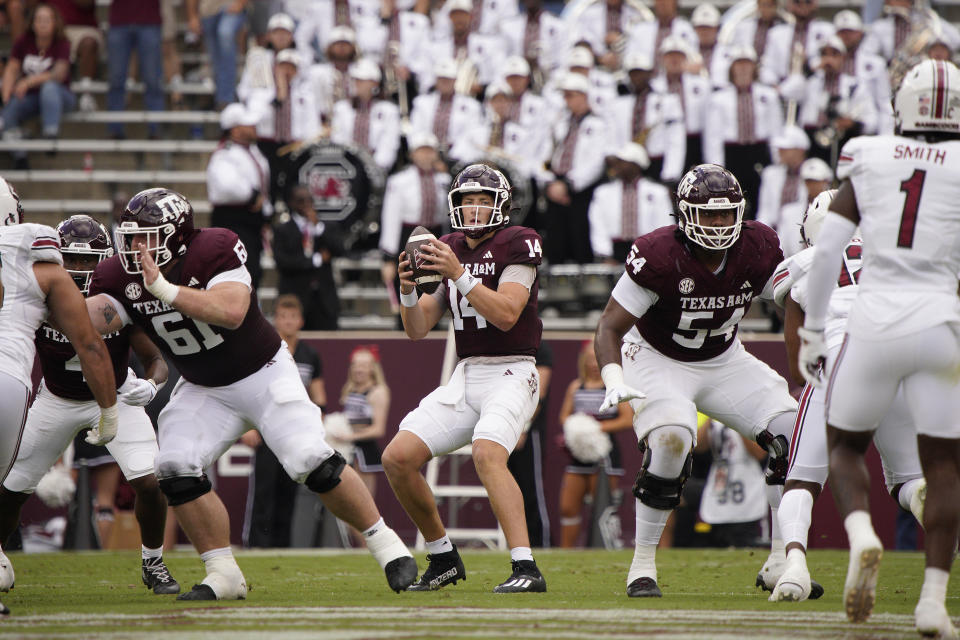 Oct 28, 2023; College Station, Texas; Texas A&M Aggies quarterback Max Johnson (14) looks to pass against the South Carolina Gamecocks during the first quarter at Kyle Field. Dustin Safranek-USA TODAY Sports
