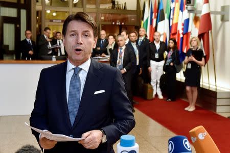 Italian Prime Minister Giuseppe Conte leaves a European Union leaders summit in Brussels, Belgium, June 29, 2018. REUTERS/Eric Vidal