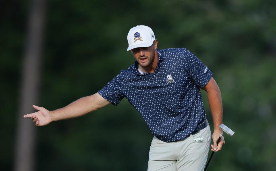 Bryson DeChambeau of the United States reacts on the eighth green