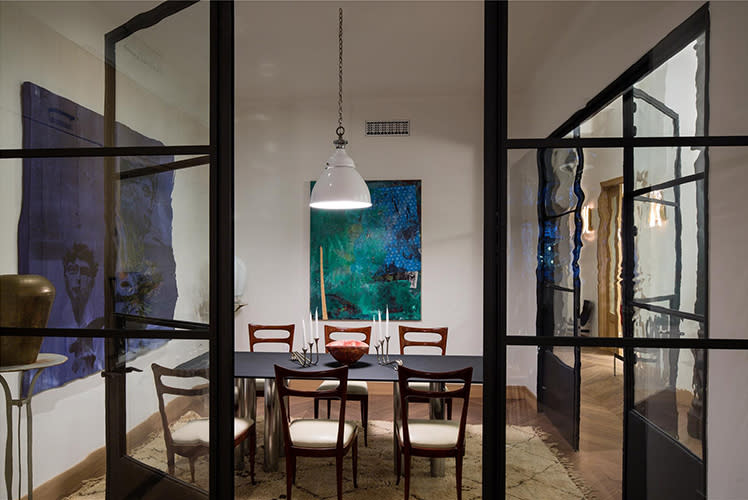 <p>The dining room is encased in glass walls. </p>