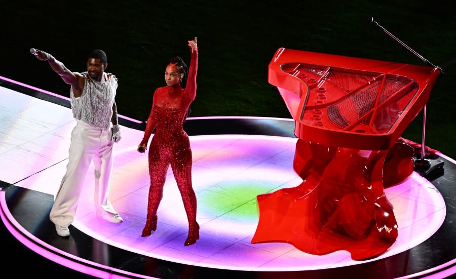 US singer-songwriters Usher and Alicia Keys perform during Apple Music halftime show of Super Bowl LVIII between the Kansas City Chiefs and the San Francisco 49ers at Allegiant Stadium in Las Vegas, Nevada, February 11, 2024. (Photo by Patrick T. Fallon / AFP) (Photo by PATRICK T. FALLON/AFP via Getty Images)