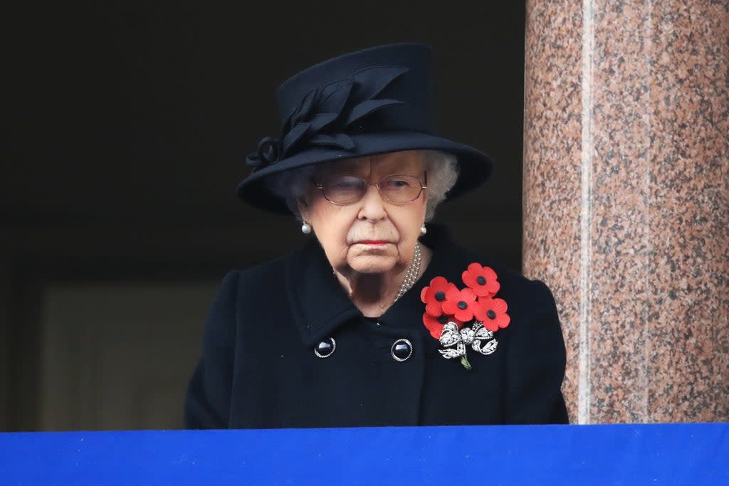 The Queen observing the Remembrance ceremony from the balcony of the Foreign, Commonwealth and Development Office (Aaron Chown/Archive/PA) (PA Archive)