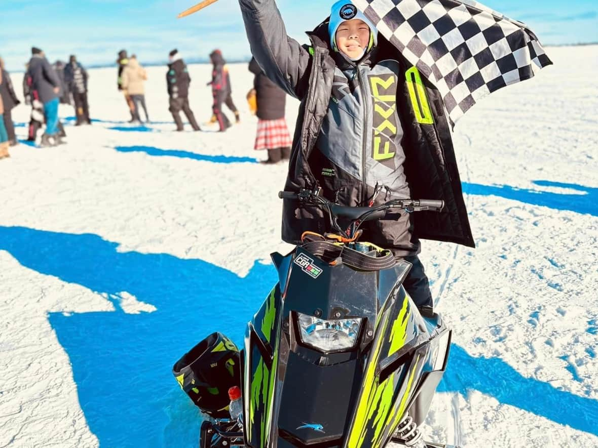 Karter Shecapio from Mistissini, Que., is really into competitive snowmobile racing. With his family's help, the nine-year-old got his wish of a new Ski-Doo and so far this season has been on the podium in both races he's competed in.  (submitted by Ruby Gunner - image credit)