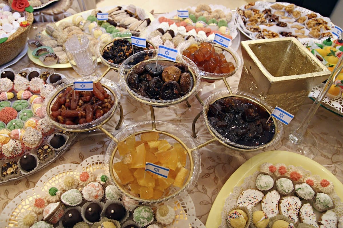 A table of sweets and jams for Mimouna, a traditional North African Jewish celebration held the day after Passover.