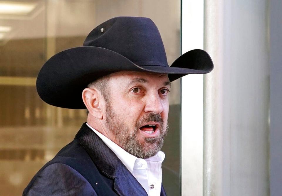 Otero County Commissioner Couy Griffin speaks as he arrives at the Federal Court House in Washington, Monday, March 21, 2022. Griffin is charged with illegally entering Capitol grounds the day a pro-Trump mob disrupted certification of Joe Biden's presidential election victory on Jan. 6, 2021.