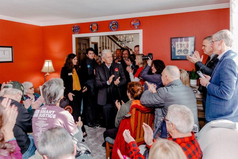 Michael Douglas (in black) campaigning for Mike Bloomberg in Wisconsin on Saturday | Mike Bloomberg 2020