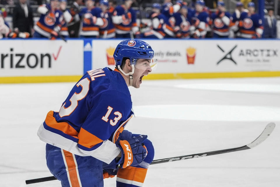 New York Islanders' Mathew Barzal (13) celebrates after scoring a goal during the second period of an NHL hockey game against the Winnipeg Jets Saturday, March 23, 2024, in Elmont, N.Y. (AP Photo/Frank Franklin II)