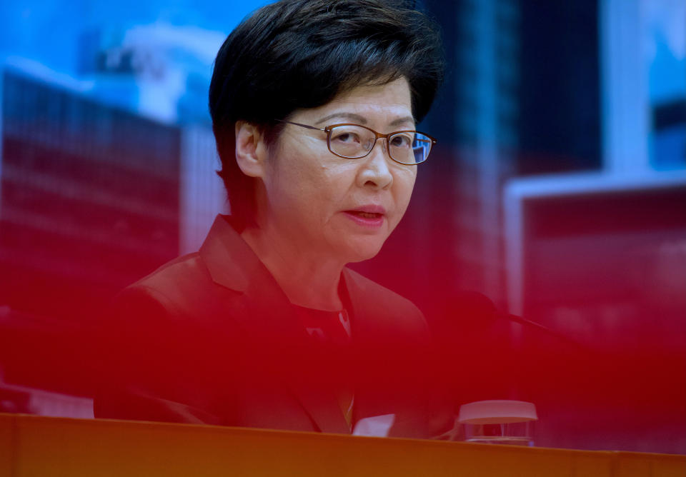 Hong Kong Chief Executive Carrie Lam speaks during a press conference in Hong Kong, Tuesday, April 13, 2021. Lam said Tuesday that Hong Kong's legislative elections would take place in December, more than a year after they were postponed last year with authorities citing public health risks from the coronavirus pandemic. (AP Photo/Vincent Yu)