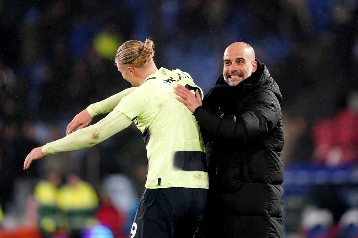 Erling Haaland (left) continues to impress his manager Pep Guardiola (PA) (PA Wire)