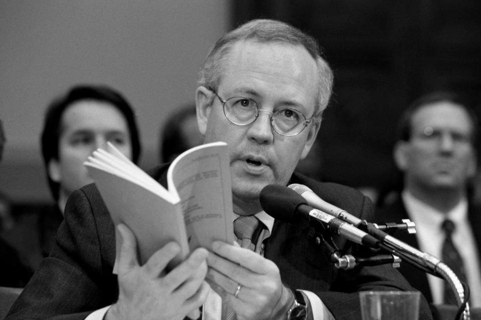 Special Prosecutor Kenneth Starr at the microphone at the House hearing.