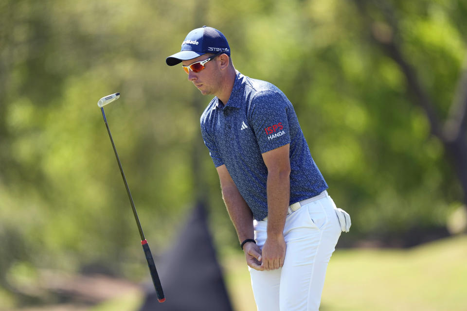 Lucas Herbert, of Australia, flips his putter as he reacts to missing a birdie putt on the fifth hole during the third round of the Dell Technologies Match Play Championship golf tournament in Austin, Texas, Friday, March 24, 2023. (AP Photo/Eric Gay)