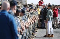 <p>President Donald Trump and first lady Melania Trump greet troops as they depart the USS Kearsarge off the coast of San Juan, Puerto Rico, Oct. 3, 2017. (Photo: Jonathan Ernst/Reuters) </p>