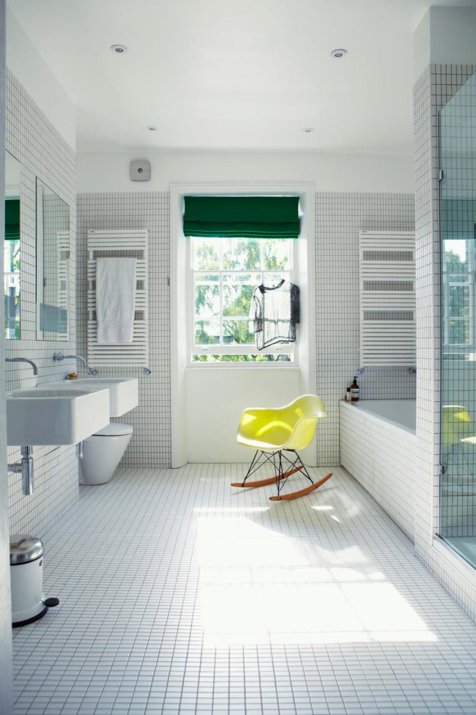 A bathroom with ceiling downlights