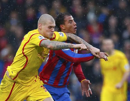 Liverpool's Martin Skrtel (L) challenges Crystal Palace's Marouane Chamakh during their English Premier League soccer match at Selhurst Park in London November 23, 2014. REUTERS/Eddie Keogh