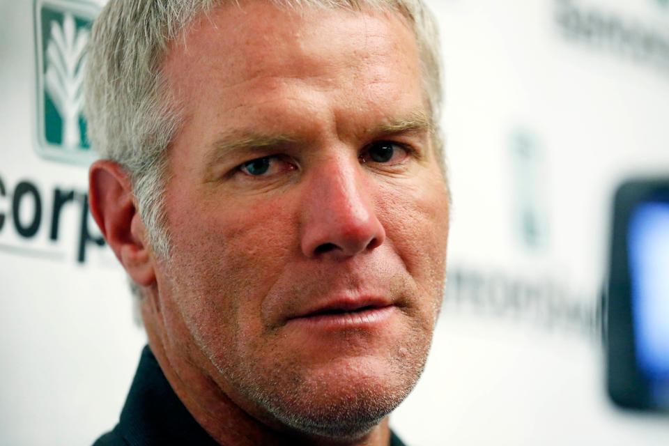 Former NFL quarterback Brett Favre speaks with reporters prior to his induction to the Mississippi Hall of Fame in Jackson, Miss., Saturday, Aug. 1, 2015.