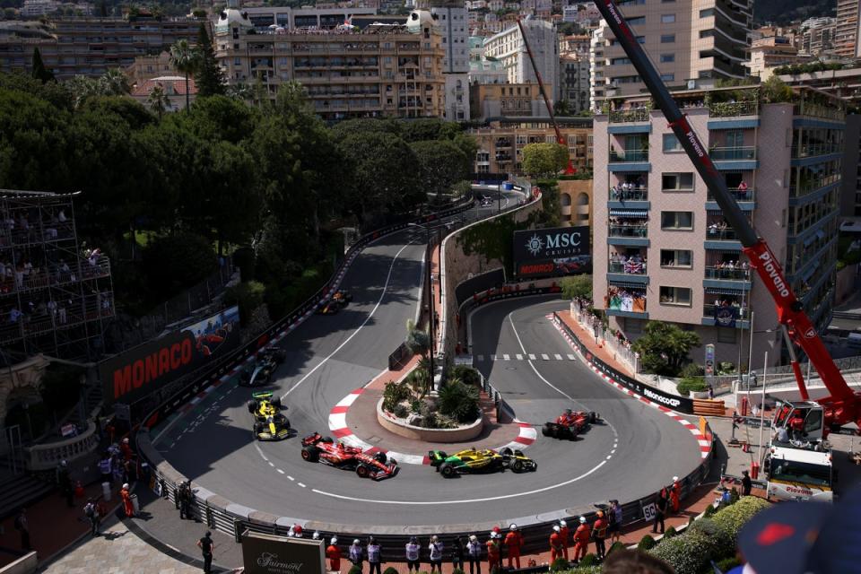 The front four cars stay in position around the Grand Hotel hairpin (Getty)