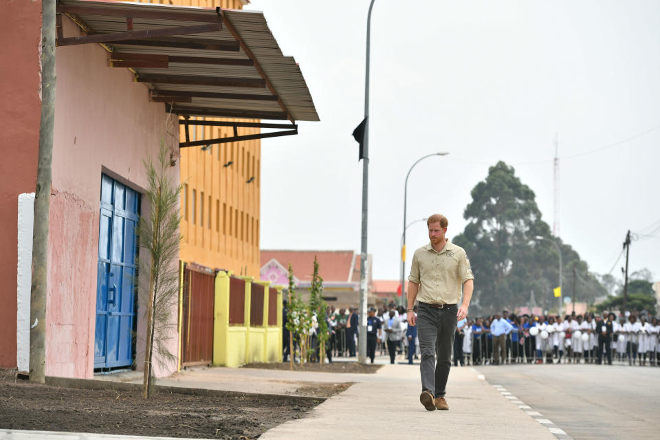 September 27, 2019: Prince Harry walks through the town which was once a minefield that Princess Diana famously walked through in 1997