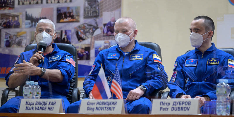 The Soyuz MS-18/64S crew answers questions during a pre-launch news conference at the Baikonur Cosmodrome. Left to right: Mark Vande Hei, Soyuz commander Oleg Novitskiy and flight engineer Pyotr Dubrov. / Credit: NASA