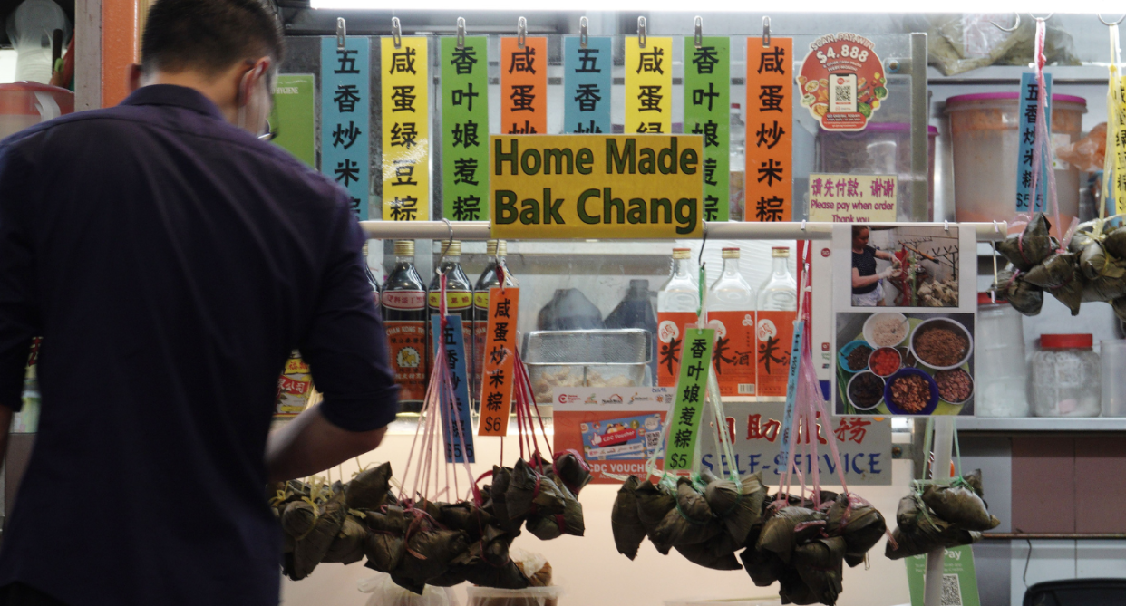 Rice dumplings of various flavours, normally eaten as part of the celebration of the Dragon Boat Festival, are seen at a stall in Singapore's Chinatown hawker centre on 10 June 2021. (Photo by Then Chih Wey/Xinhua via Getty Images)