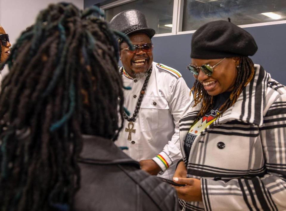 In the greenroom of the New Year’s Day Jepther “Luciano” McClymont, center, shares some laughter with young reggae female artists as they were welcomed to met “Luciano” after his performance at Miramar’s Regional Park Amphitheatre on New Year’s Day, Monday, January 1, 2024.