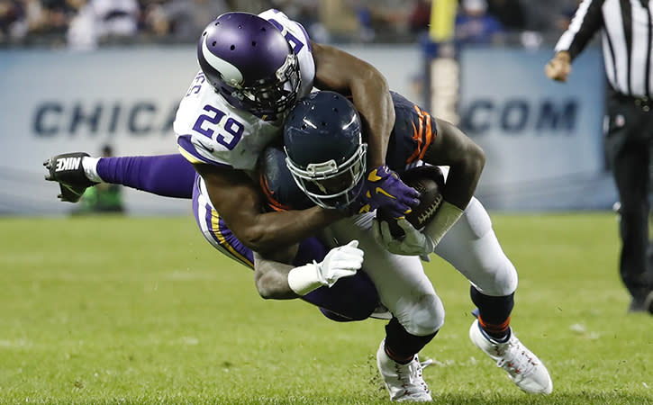 Oct 31, 2016; Chicago, IL, USA; Minnesota Vikings cornerback Xavier Rhodes (29) tackles Chicago Bears wide receiver Alshon Jeffery (17) during the second half at Soldier Field.