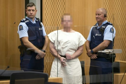 Brenton Tarrant, the man accused of carrying out the Christchurch massacre, appears in court the day after the mass killing