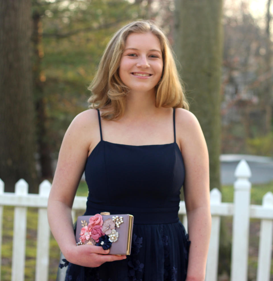 Ellie Anderson, 16, had searched for the perfect dress for her Junior Prom. She was able to wear it when her siblings threw her a surprise prom in the basement of her family's home in Montgomery County, Pennsylvania.  (Courtesy of Jennifer Anderson)