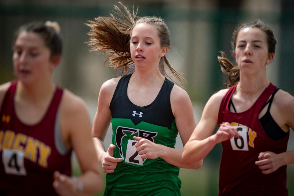 Fossil Ridge High School's Mia Williams, center, competes in the girls 1600-meter race during the Jack Christiansen Track meet at Colorado State University's Jack Christiansen Memorial Track in Fort Collins on Saturday, April 23, 2022.