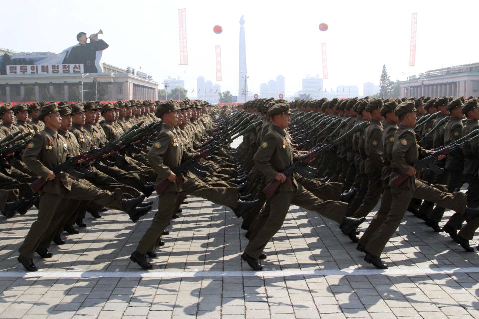 FILE - In this Sept. 9, 2013, file photo, North Korean troops march during a military parade at Kim Il Sung Square to mark the 65th anniversary of the country's founding in Pyongyang, North Korea. A massive military parade is expected on Sunday, Sept. 9, 2018, to mark the 70th anniversary of the founding of North Korea’s socialist government, Goose-stepping soldiers are the most spectacular part of North Korea’s massive military parades. (AP Photo/Jon Chol Jin, File)