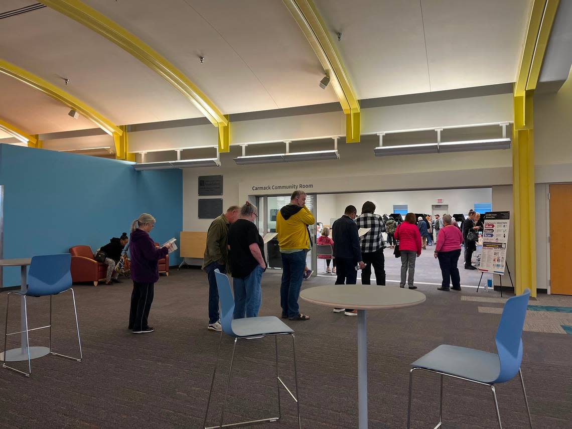 Voters line up to cast their ballots at the Johnson County Library on the morning of Tuesday, Nov. 8.